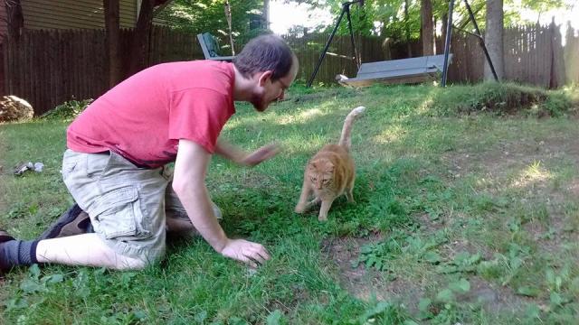 Daddy trying to pet Boo Boo, yeah right like that's going to happen while I'm in the middle of playing